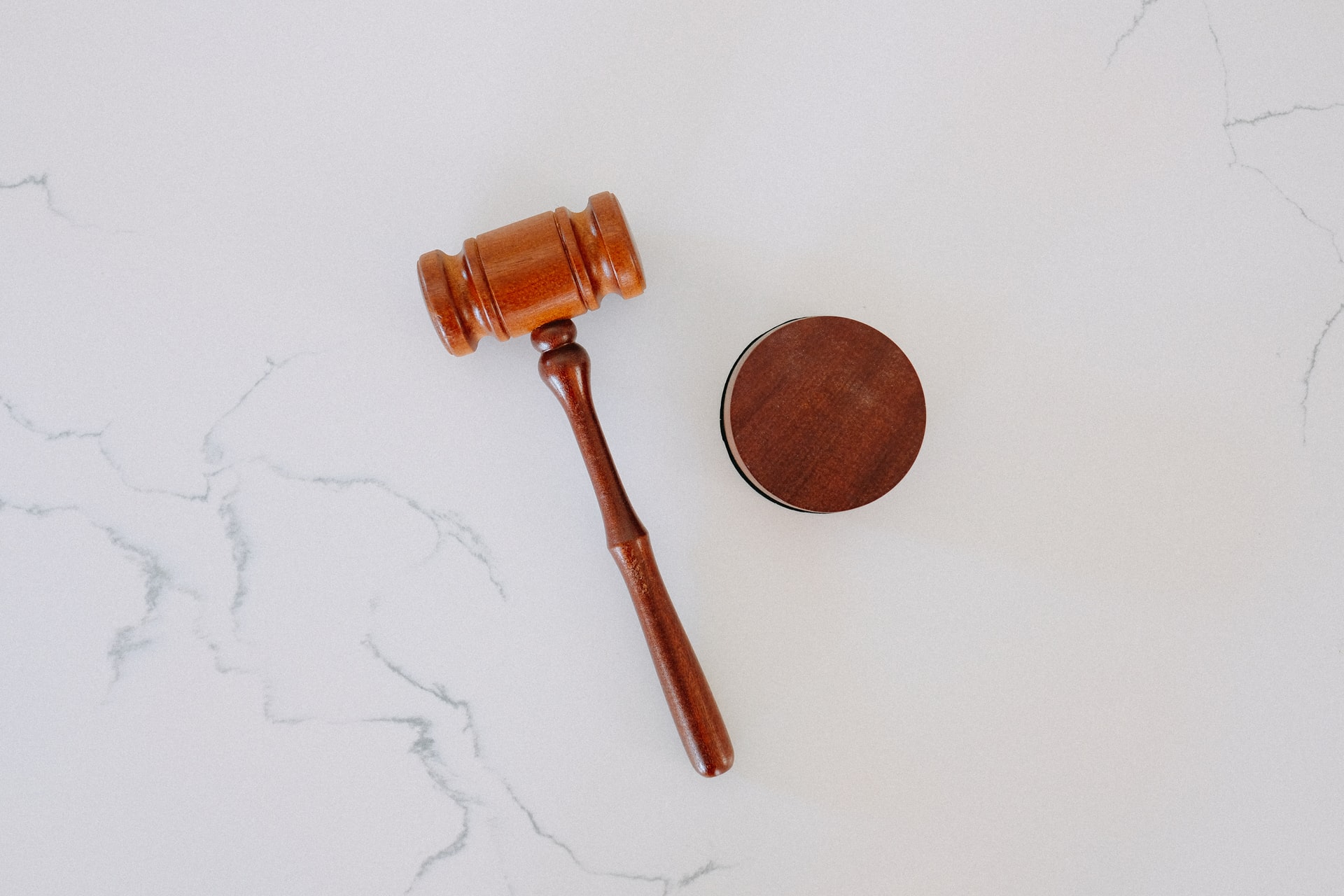 Gavel on marble platform