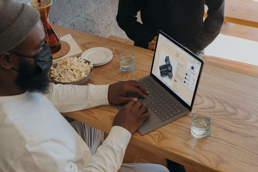 Man typing on a laptop